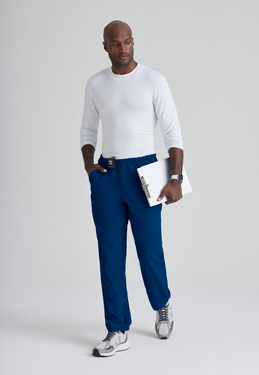 PACKABLE CONVERTIBLE PANT IN TOBACCO X MOOSE KNUCKLES - ShopperBoard