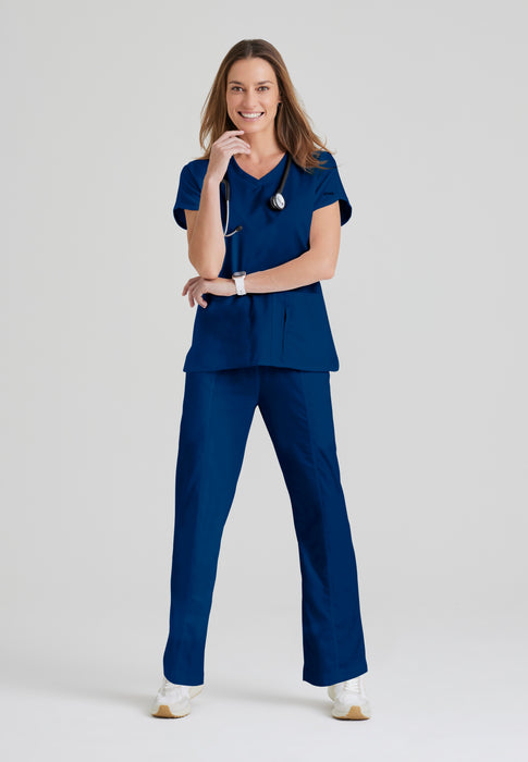 Love the design of her navy blue scrubs. Want to find something like it