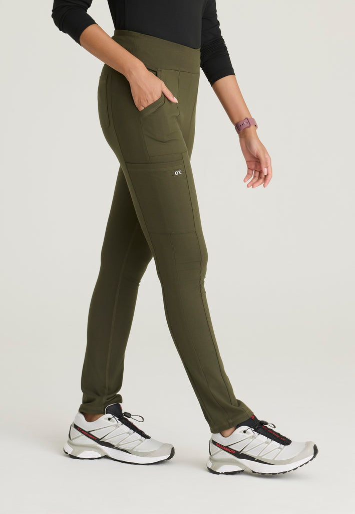 Side View of the Strive Legging in Olive from Barco One Performance Knit