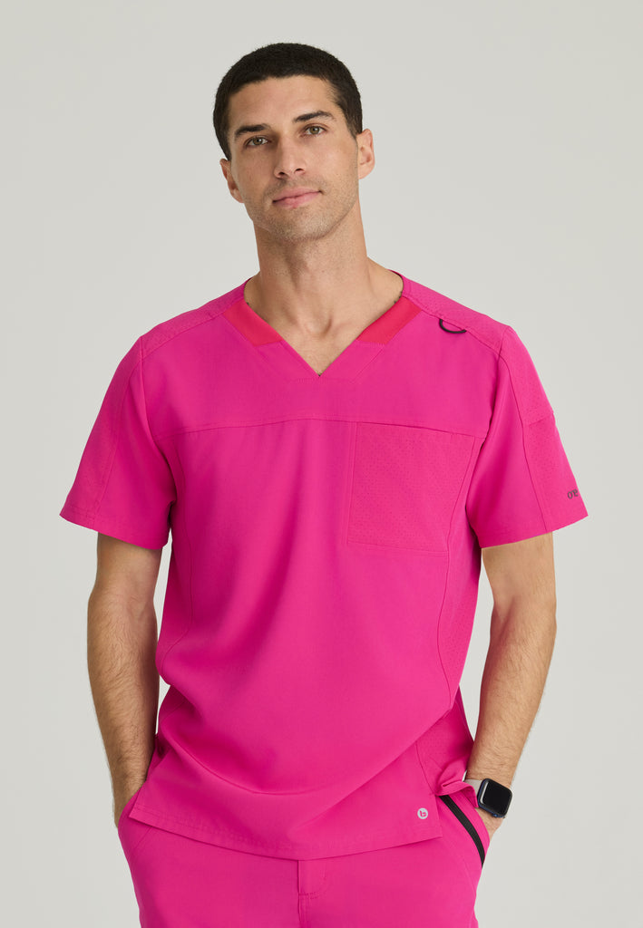 Front View of the Velocity 2-Pocket V-Neck Scrub Top in Pink from Barco One