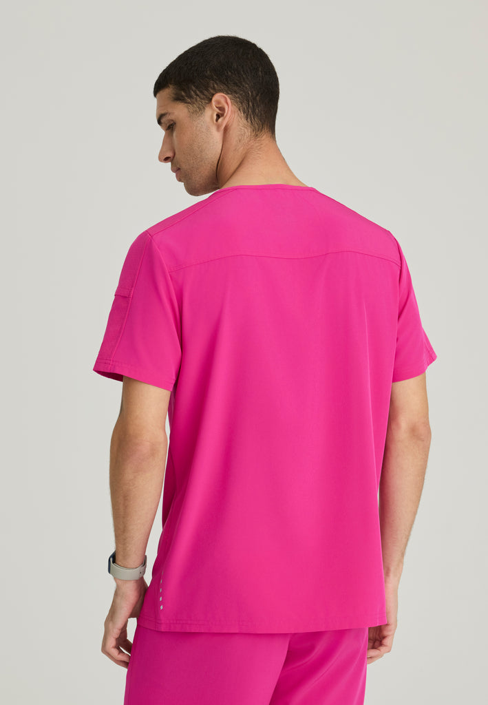 Back View of the Velocity 2-Pocket V-Neck Scrub Top in Pink from Barco One